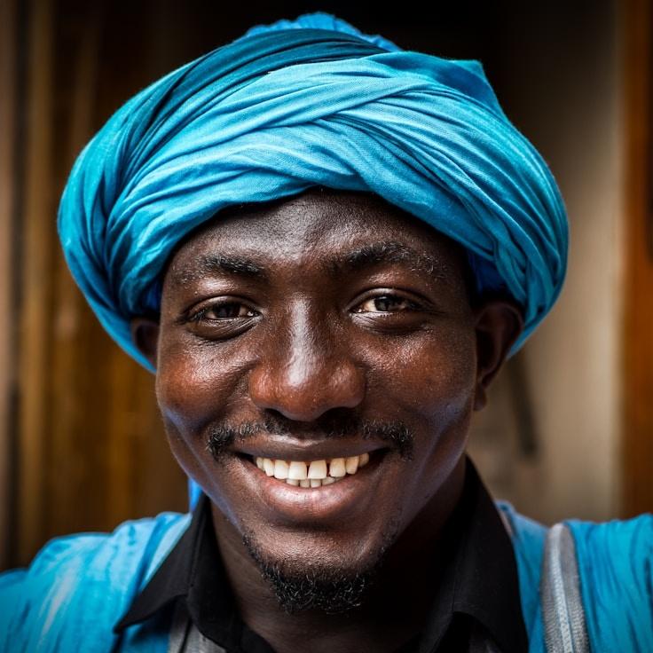 Kaveri Mehta, Lead Design Curator at FibreHarborMeadow, reviewing corporate floral arrangements